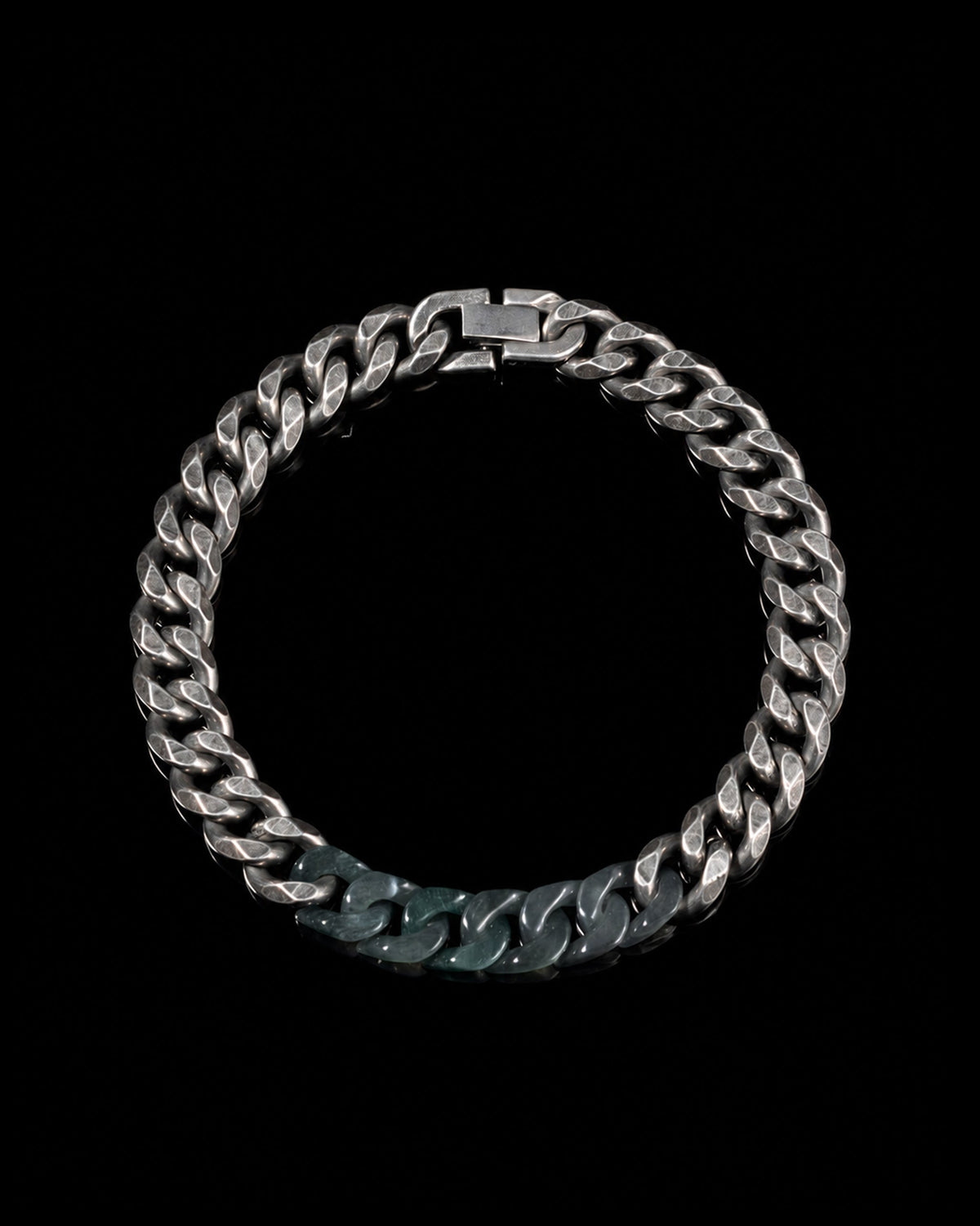Oxidised steel with jade links