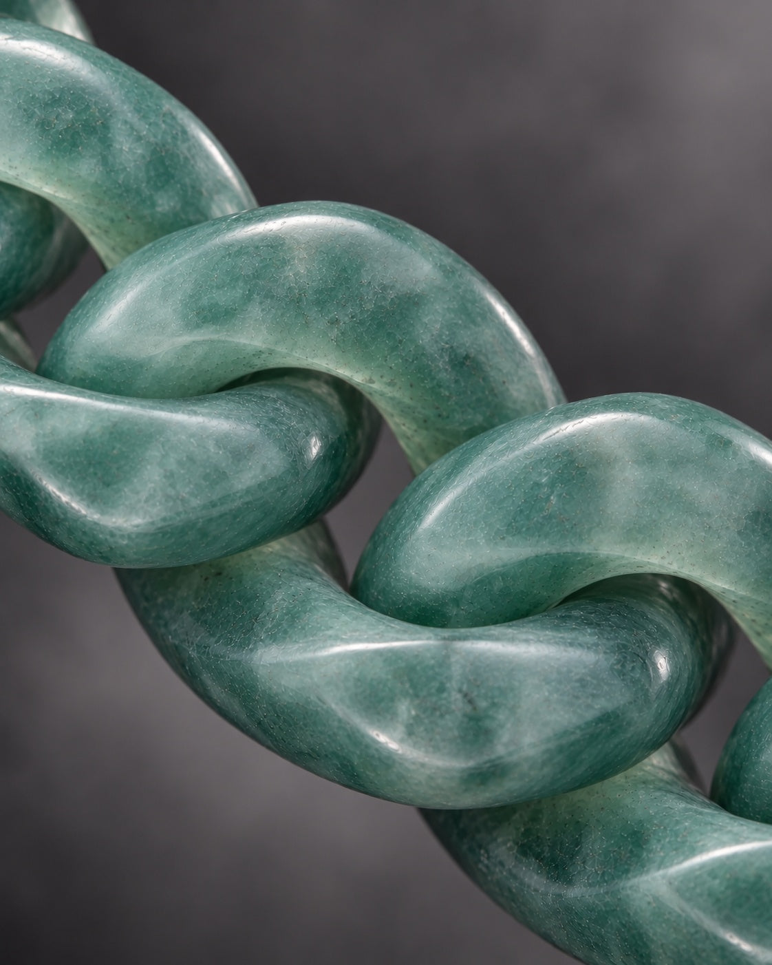 Finish texture close-up of Classic Cuban Chain Bracelet In Green Jade With Oxidized Stainless Steel