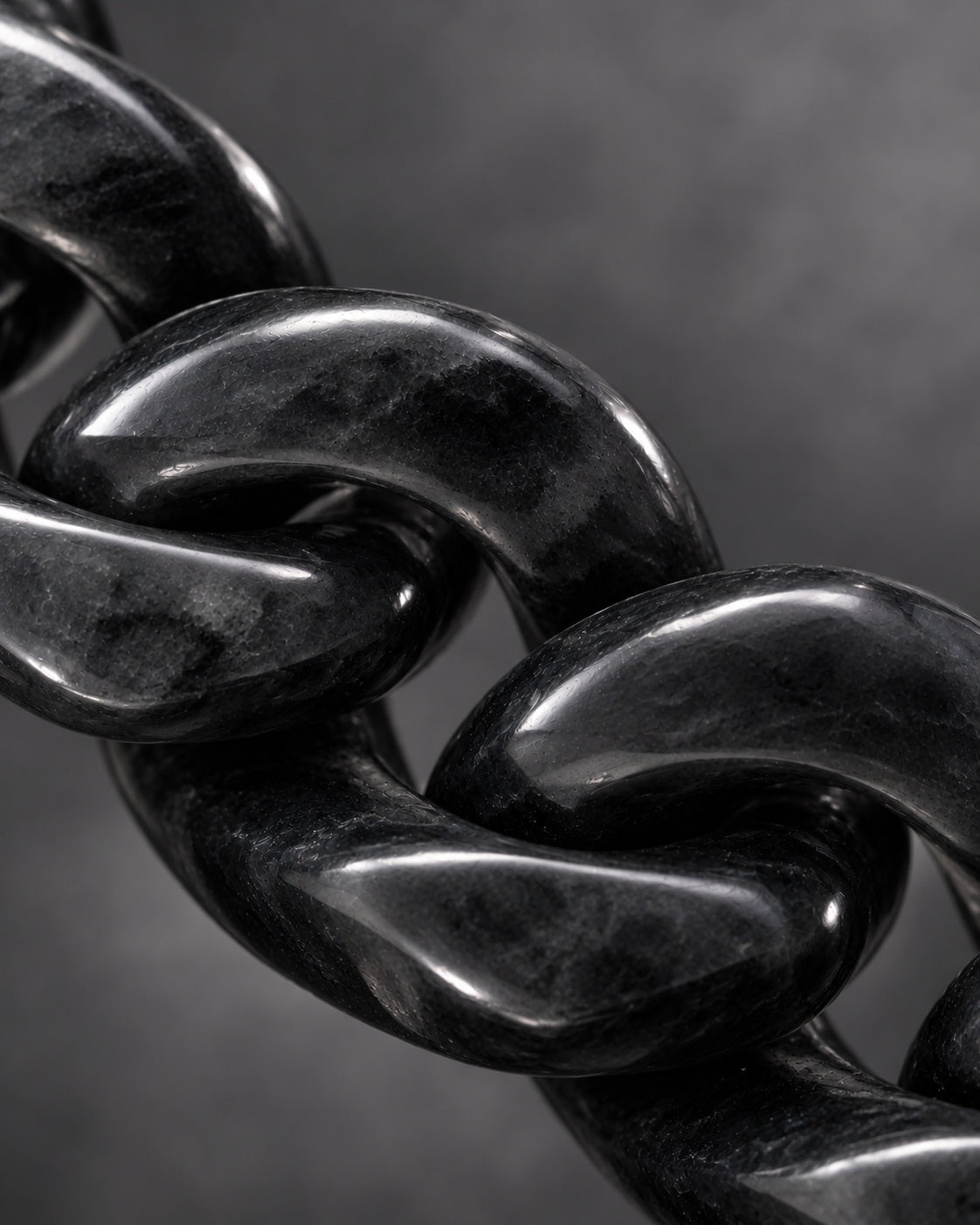 Finish texture close-up of Classic Cuban Chain Bracelet In Black Jade With Stainless Steel