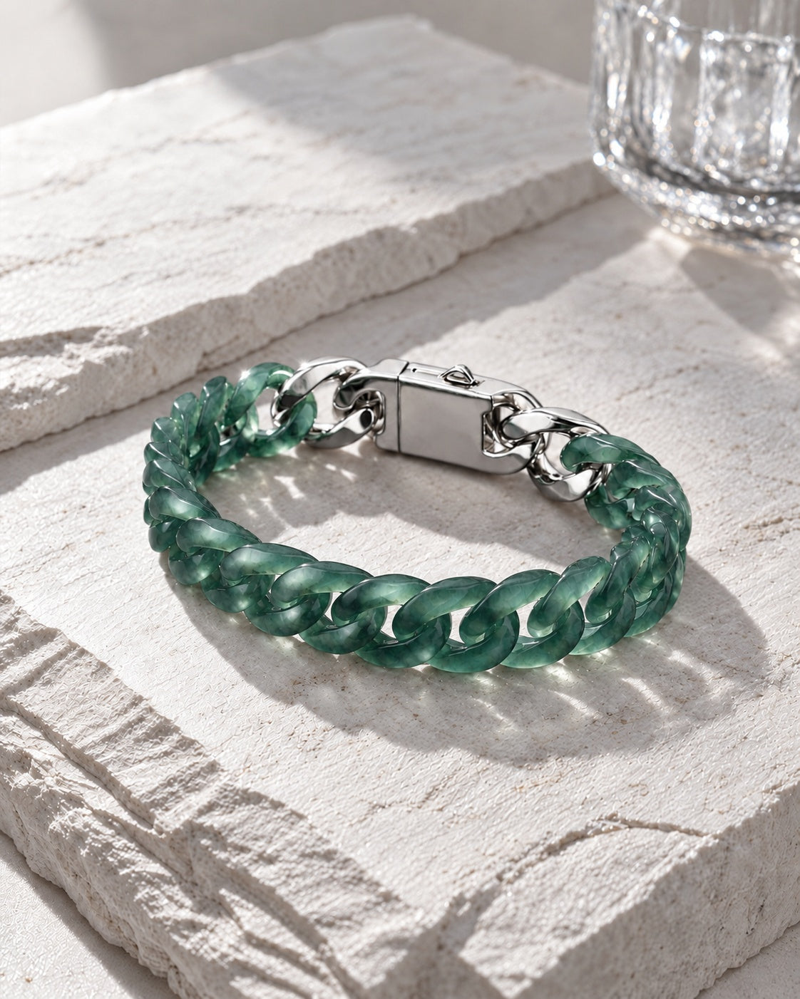 Classic Cuban Link Chain Bracelet In Top Icy Dark Green Guatemalan Jade on pale stone