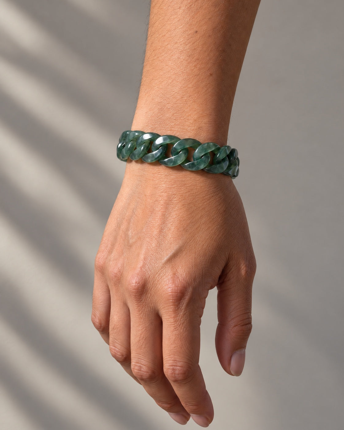 Classic Cuban Link Chain Bracelet In Top Icy Dark Green Guatemalan Jade worn on the wrist