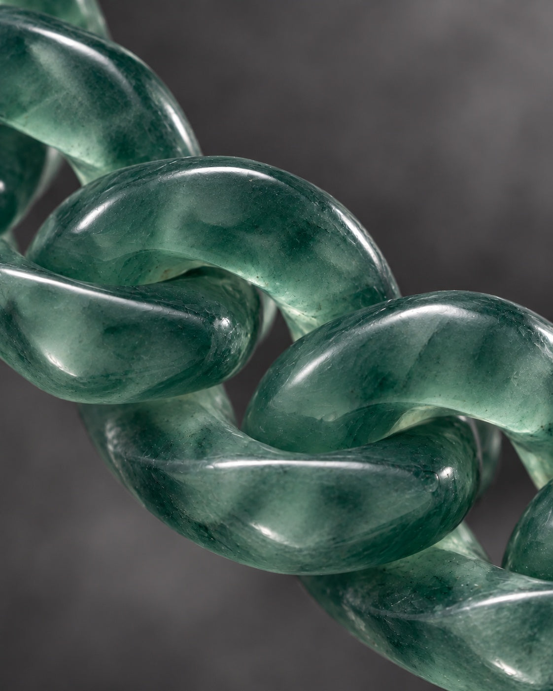 Finish texture close-up of Classic Cuban Link Chain Bracelet In Top Icy Dark Green Guatemalan Jade