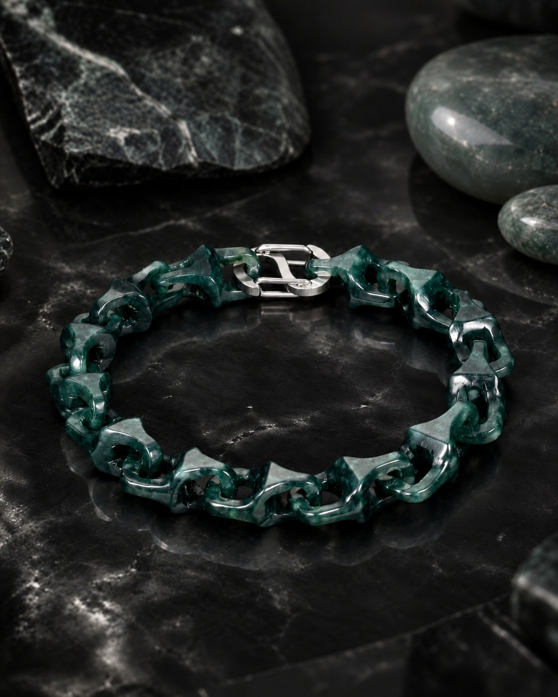 Dragon Spine Bracelet In Dark Green Mayan Jade on dark stone