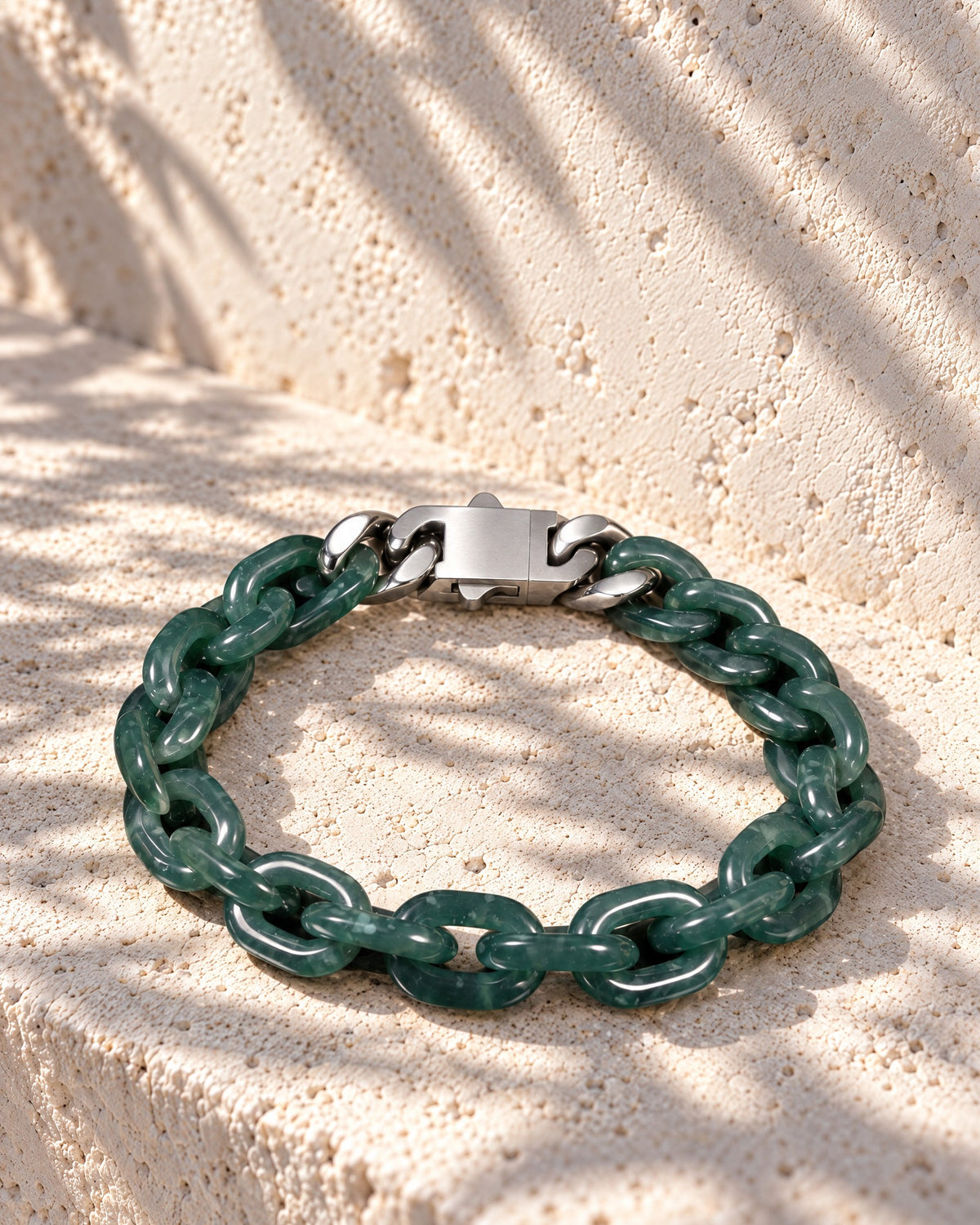Classic Cable Chain Bracelet In Green Mayan Jade on pale limestone in warm sunlight