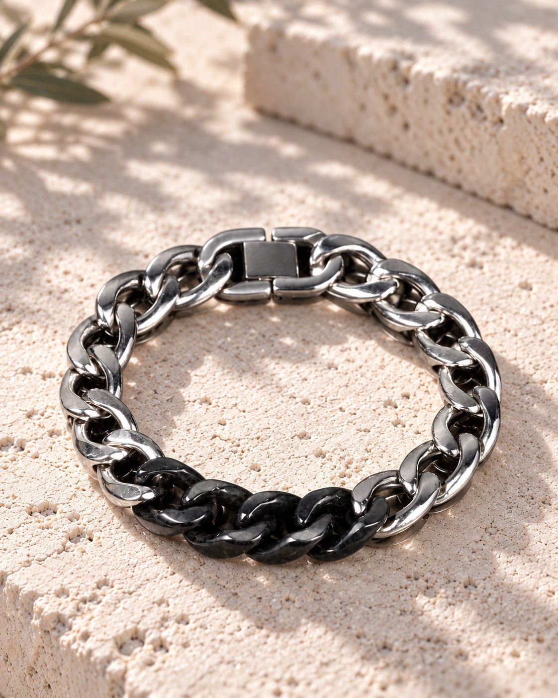 Classic Cuban Chain Bracelet In Black Jade With Stainless Steel on white stone: Pale limestone tabletop