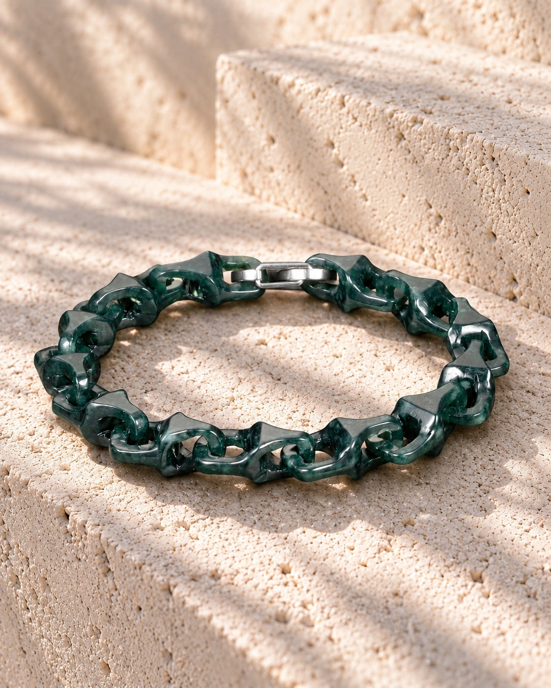 Dragon Spine Bracelet In Dark Green Mayan Jade on white stone: Offset white stone blocks