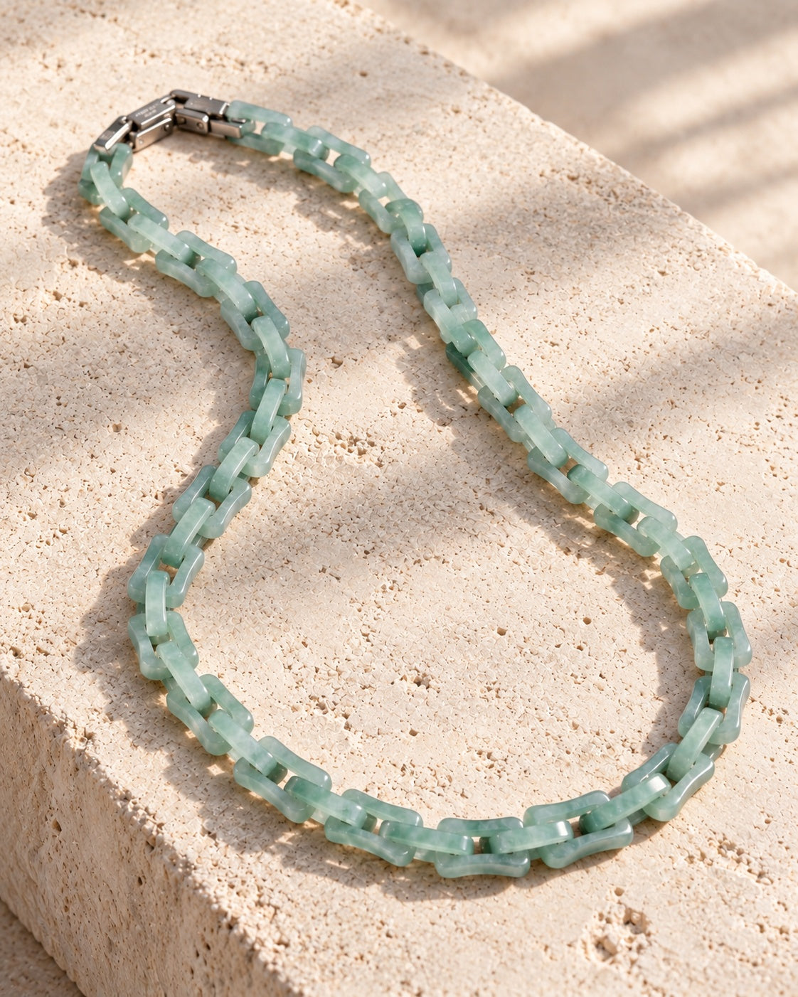 Square Cable Chain Necklace In Light Green Mayan Jade on white stone: White stone edge