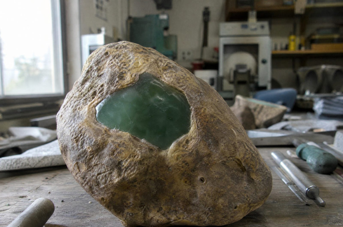 Rough jade boulder with a polished window